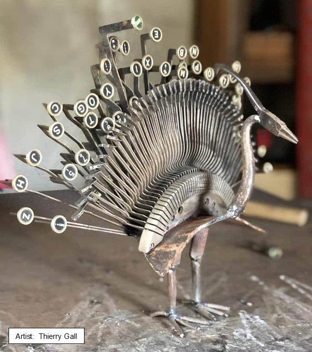 photo of unique bird sculpture made from typewriter keys